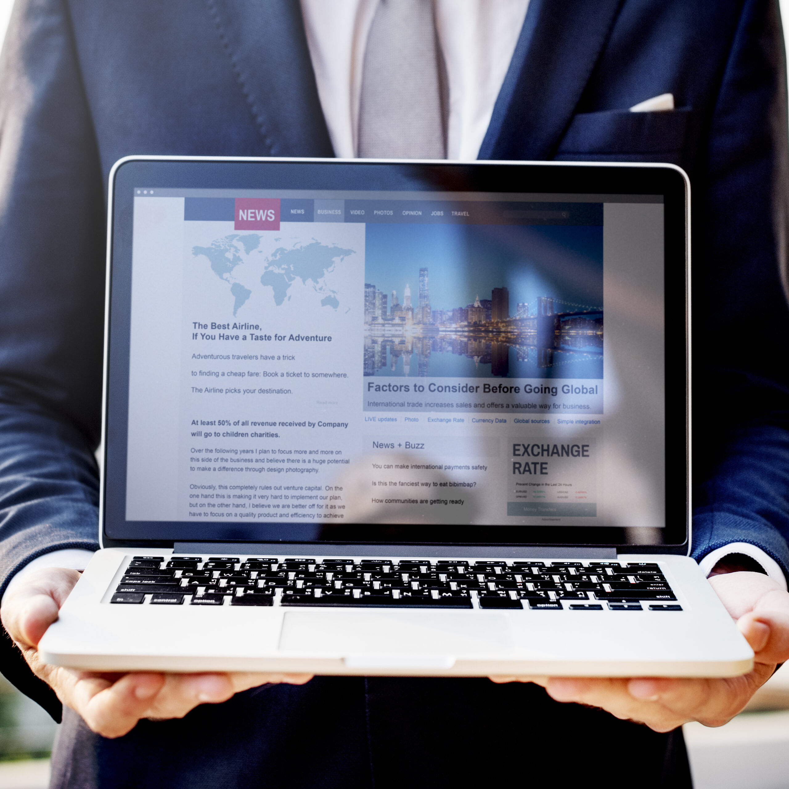 Businessman Presenting News Laptop Scaled